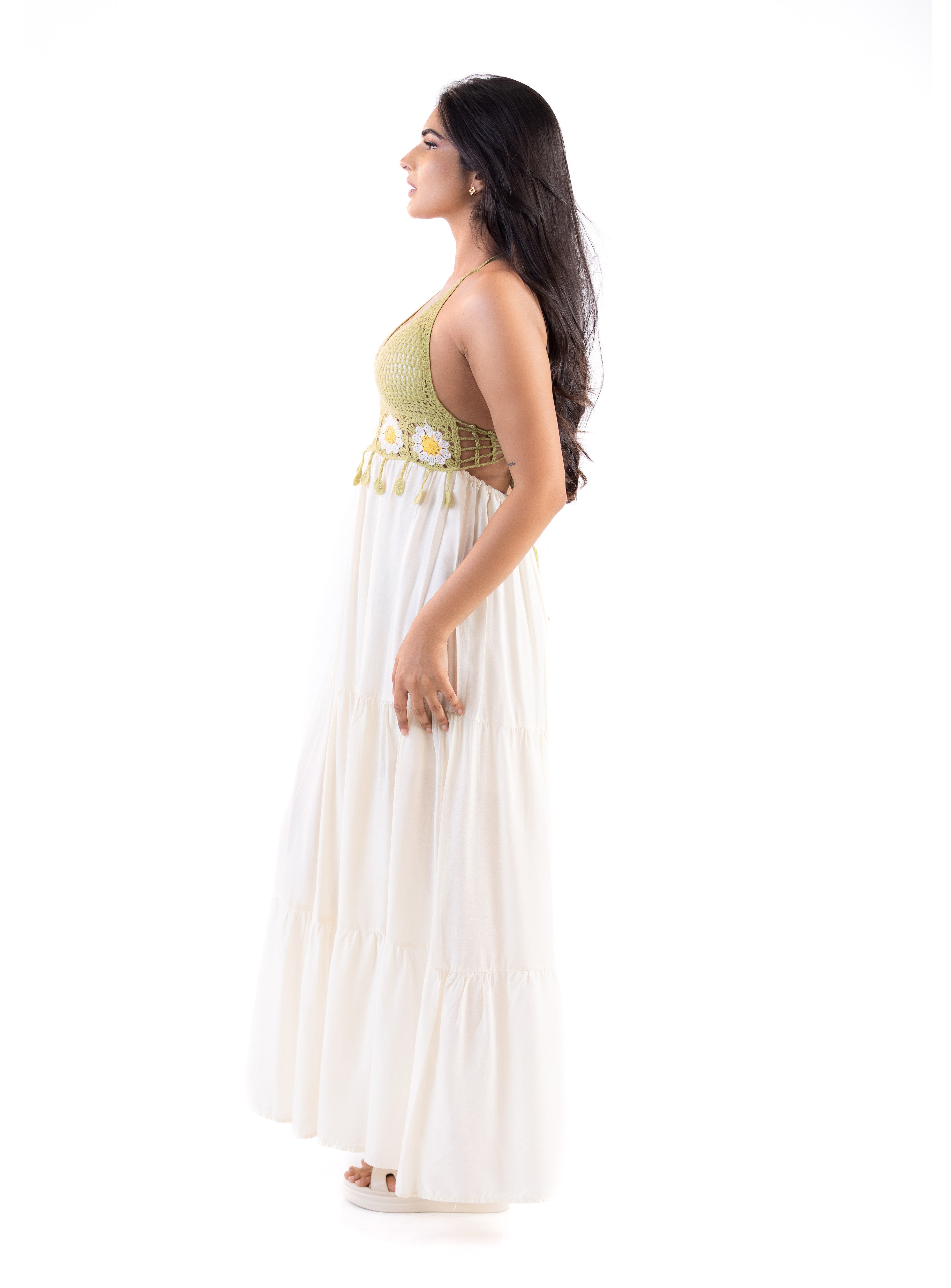 Left side view of the Fleur Haven Dress showcasing its elegant lace bodice, soft draping and flowing silhouette