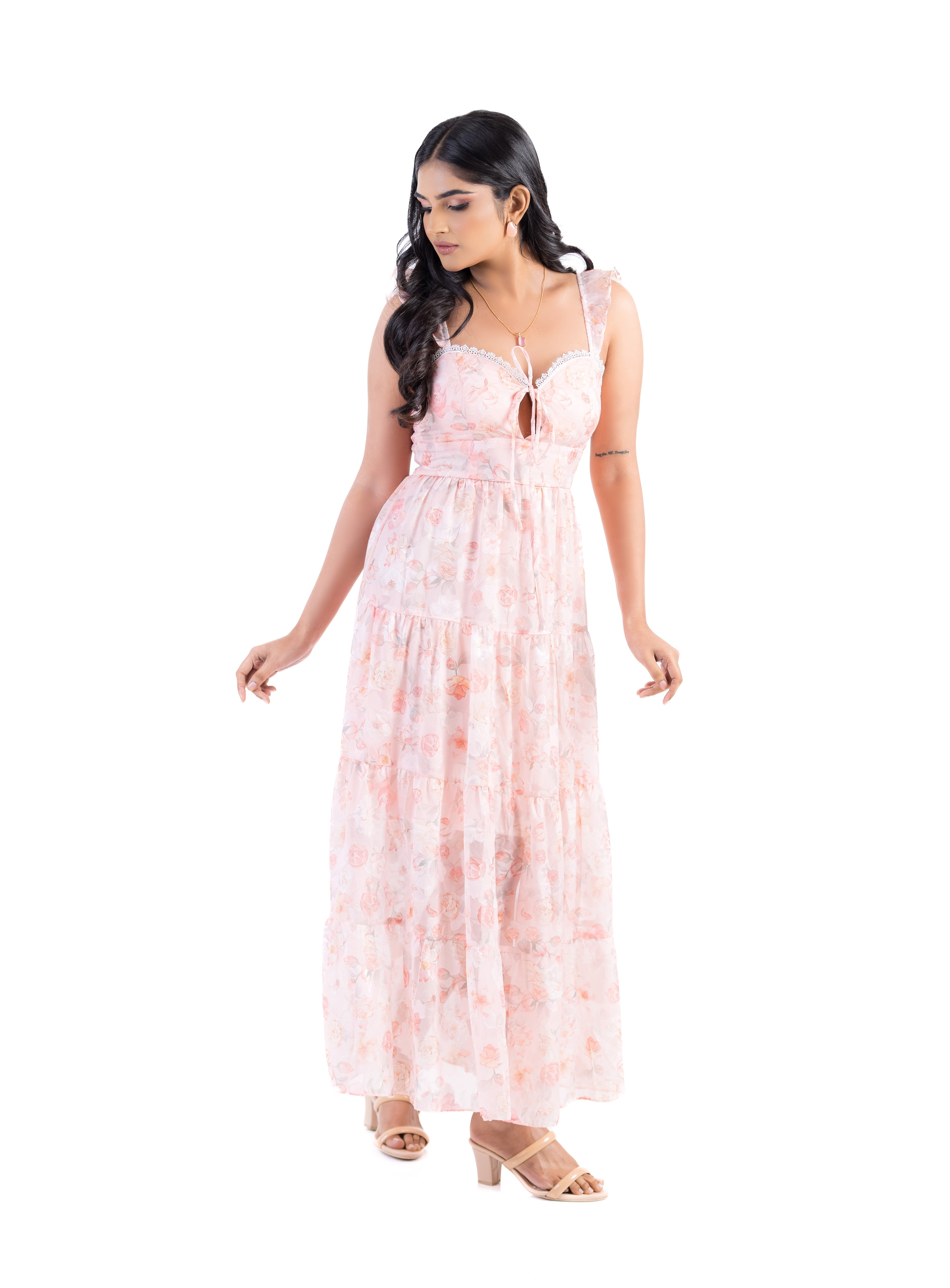 Detail view of the Floral Breeze Midi Dress featuring floral fabric, lace trim and delicate feminine design elements